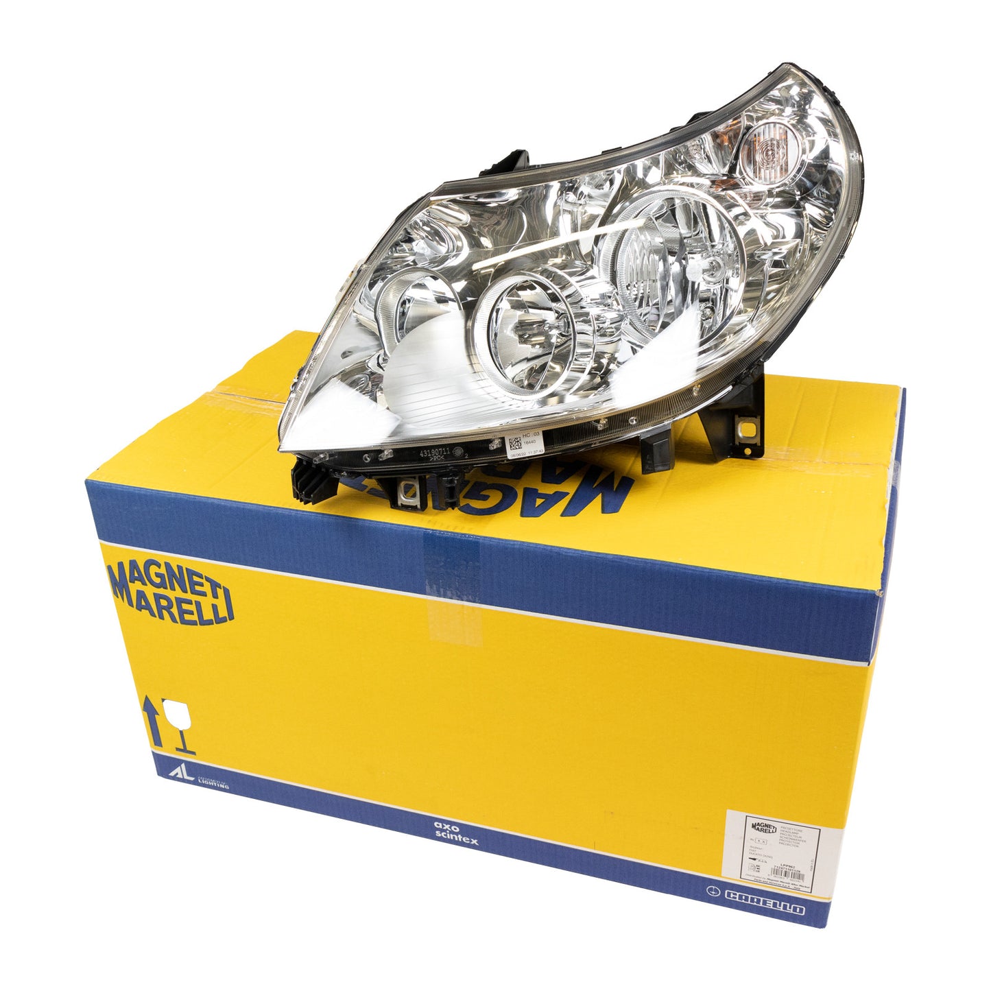 Reflektor lewy wraz z silnikiem nastawczym Magneti Marelli