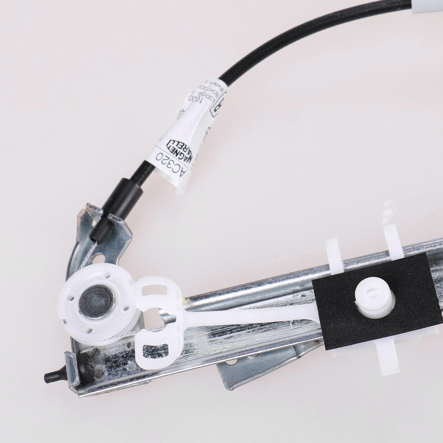 Podnośnik elektryczny przedni prawy  Magneti Marelli