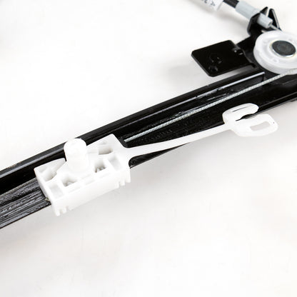 Podnośnik elektryczny przedni lewy  Magneti Marelli