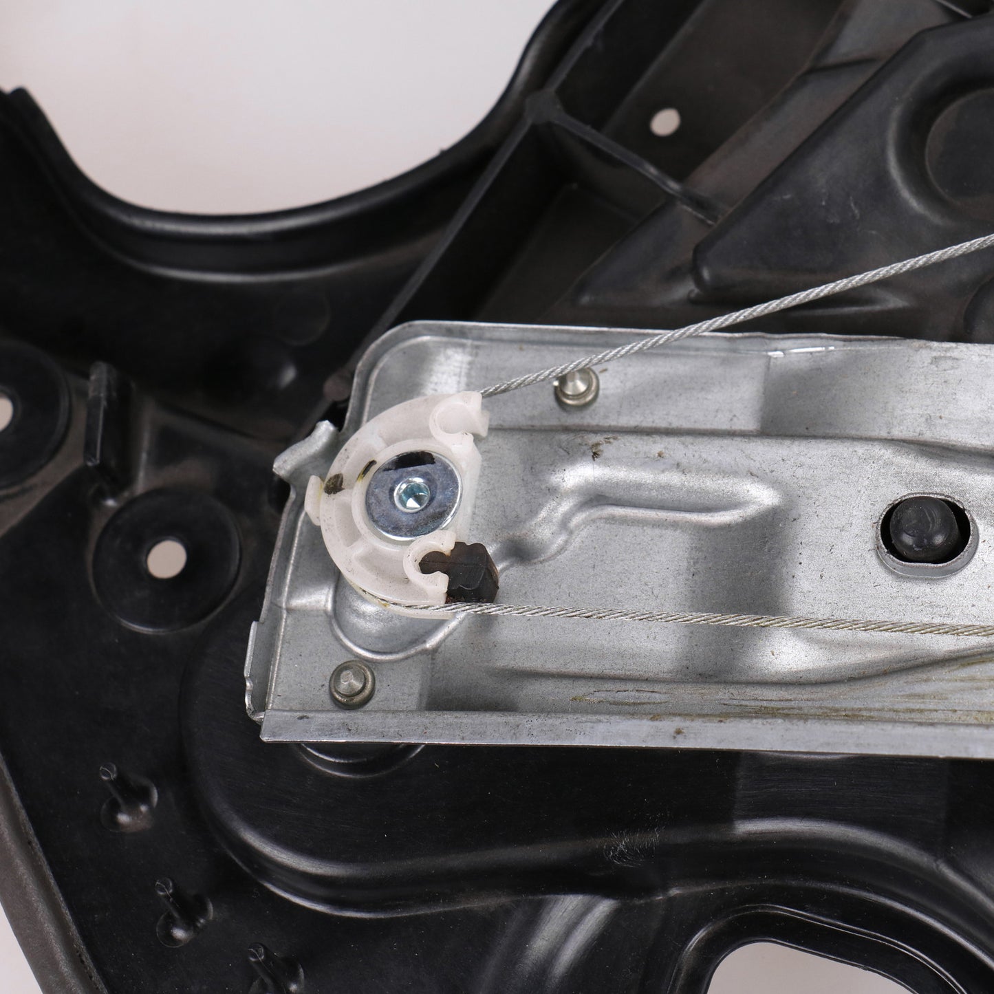 Mechanizm podnośnika szyby tylnej lewej