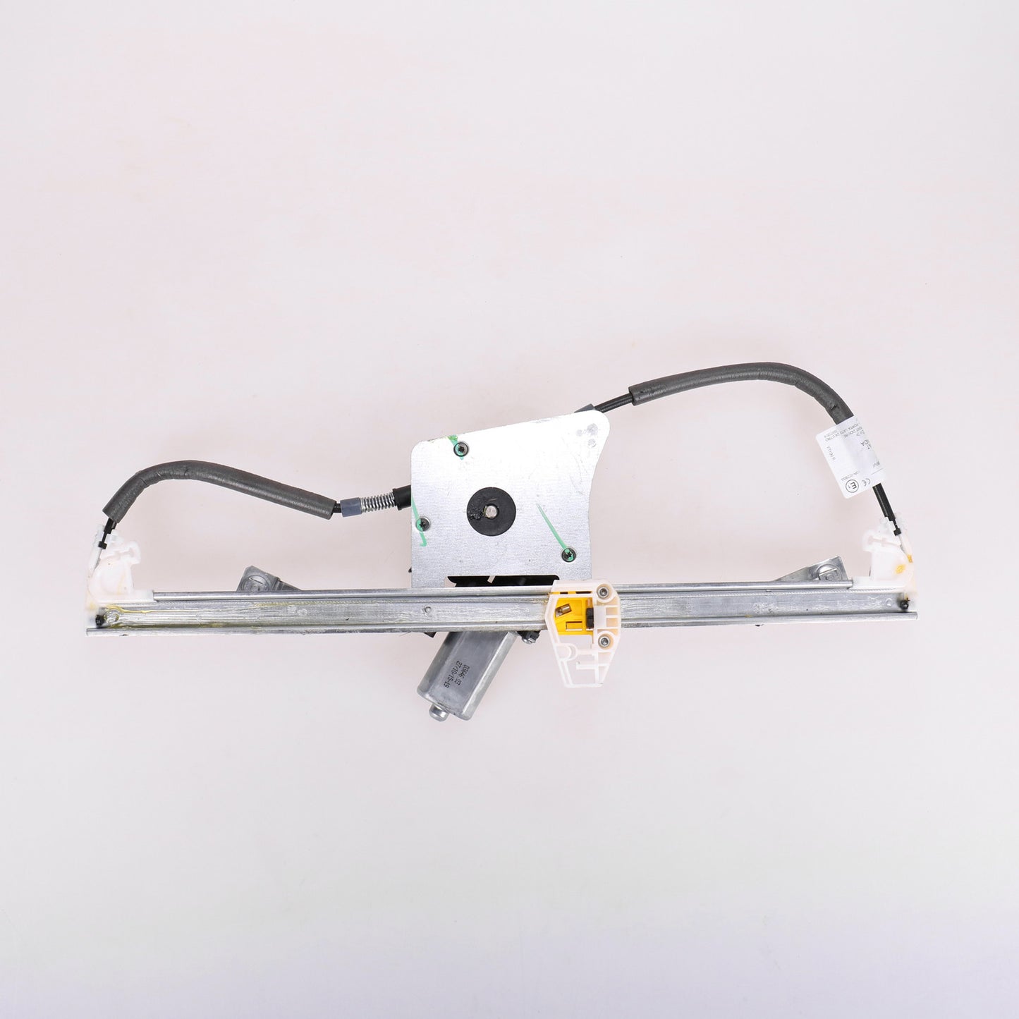 Podnośnik elektryczny przedni prawy z silnikiem Magneti Marelli