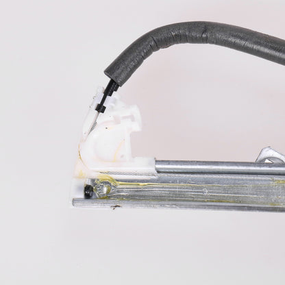 Podnośnik elektryczny przedni prawy z silnikiem Magneti Marelli