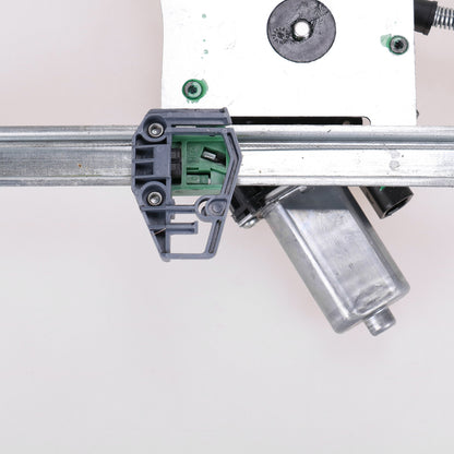 Podnośnik elektryczny przedni lewy z silnikiem Magneti Marelli