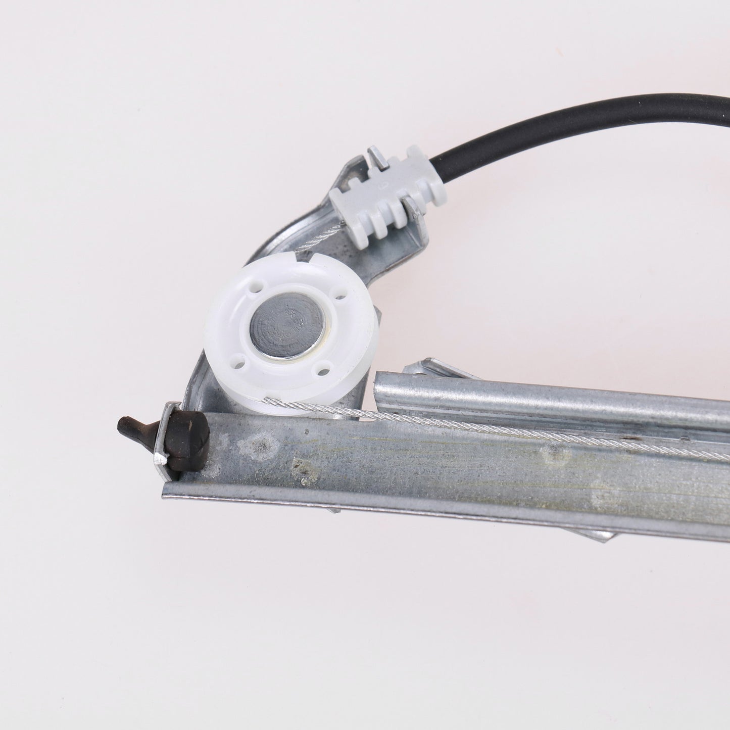 Elektryczny podnośnik przedni lewy bez silnika, tylko mechanizm
