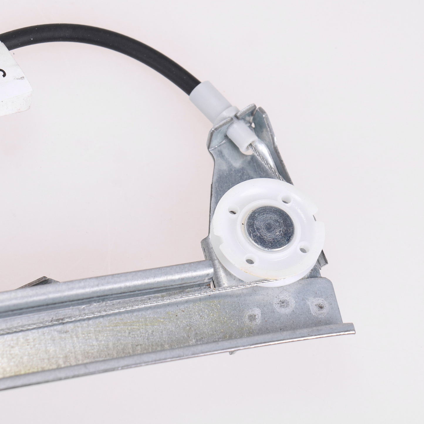 Elektryczny podnośnik przedni lewy bez silnika, tylko mechanizm