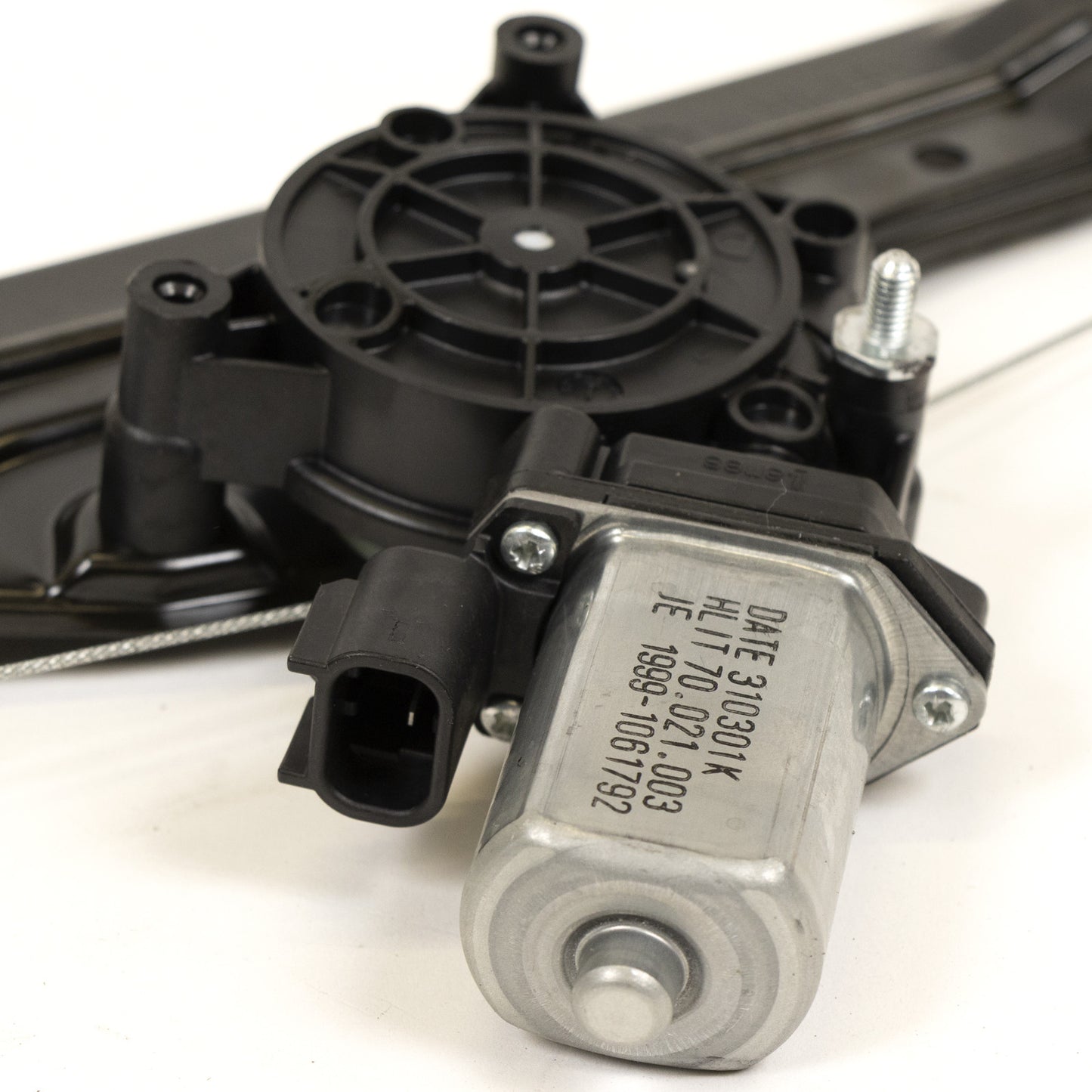 Podnośnik elektryczny przedni lewy z silnikiem Magneti Marelli