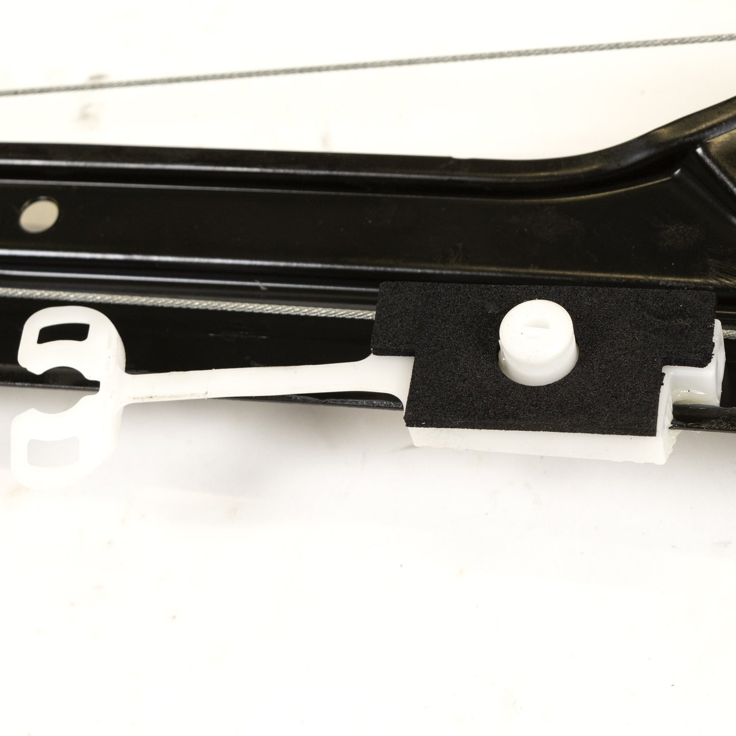 Podnośnik elektryczny przedni lewy z silnikiem Magneti Marelli