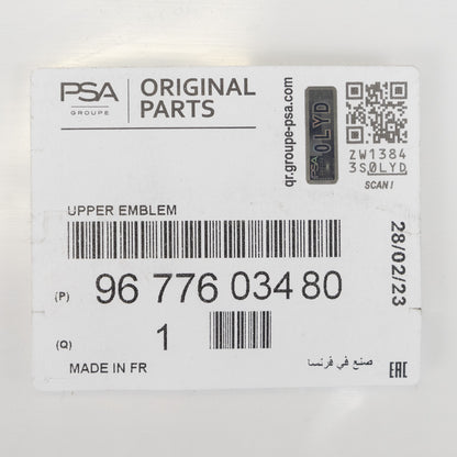 Emblemat kątowy górnej części osłony chłodnicy PSA OE 9677603480