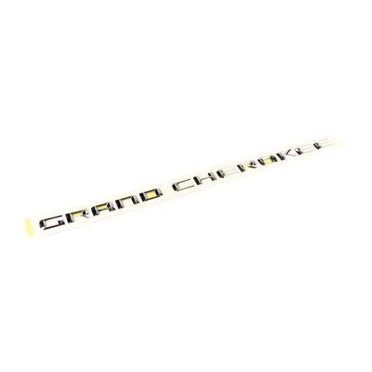 Boczny emblemat "Grand Cherokee" na drzwi Jeep Grand Cherokee K68110321AC